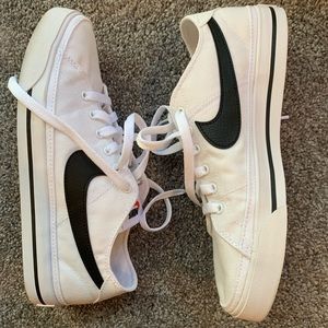 Mens 7 (Women’s 8.5) white Nikes
